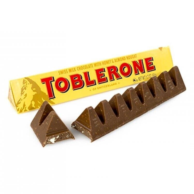 Toblerone Milk Chocolate w/ Honey & Almond 100g - Sahara Specialty Foods